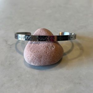 Floral cuff with engraving